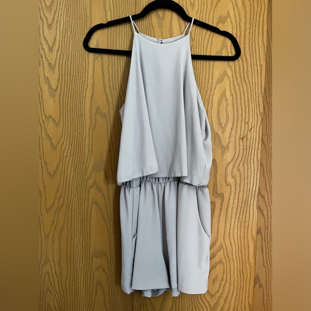 Gray Romper with pockets. Size small.